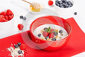 Oatmeal Breakfast in Bowl with Fruit Berries