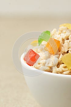 Oatmeal breakfast bowl. Organic healthy food with candied fruit