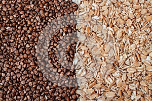 Oatmeal and buckwheat two healthy breackfast seeds tipes above view photo