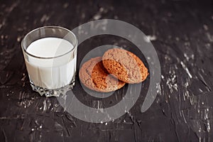 Oatmeal cookies and fresh milk. Top view. The concept of healthy