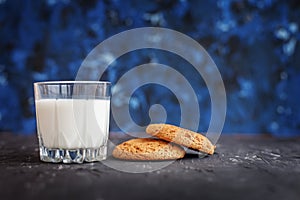 Oatmeal cookies and a glass of milk. The concept of healthy eating and vegetarianism.
