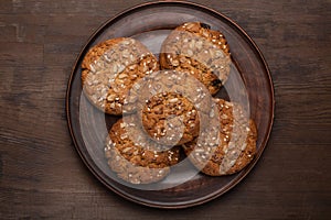 Oatmeal cookies with sesame on a plate