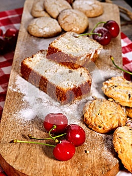 Oatmeal cookies snack and cherry breakfast close up