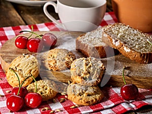 Oatmeal cookies snack and cherry cupcake breakfast