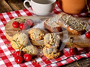 Oatmeal cookies snack and cherry cupcake breakfast