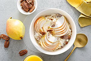 Oatmeal with cottage cheese, pecan nuts and pear for breakfast