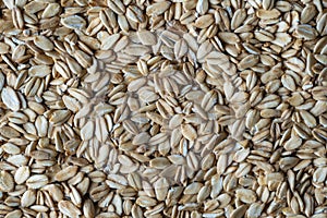 Oatmeal. Oat flakes.Dry oat flakes grains background, close up, top view. Food background