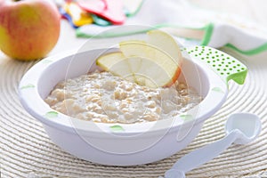 Oatmeal porridge with apple for children nutrition