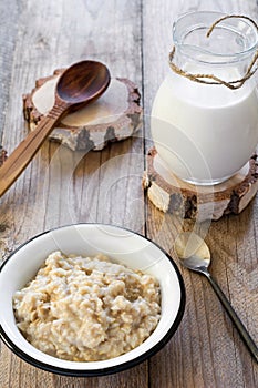 Oatmeal porridge and milk, healthy breakfast