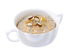 Oatmeal porridge with nuts, isolated