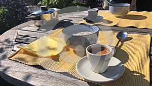 Oatmeal on the terrace in the sun In garden