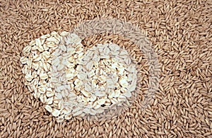 Oats seeds and oat-flakes heart