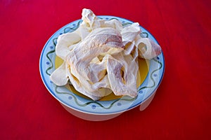 Oaxaca cheese from Mexico in a plate photo