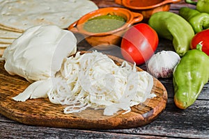 Oaxaca Chesse or queso oaxaca or quesillo is a Mexican fresh white Chesse from Mexico photo