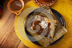 Oaxacan mole tamale flatlay photo