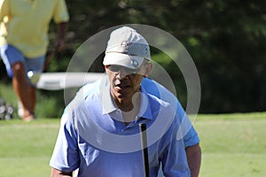 Obama playing golf Hawaii
