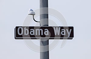 Obama Way Street Sign with Surveillance Camera photo