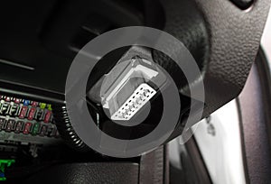 OBD2 or OBDII port for diagnostic of Electronic Control Unit or ECU module in a car photo