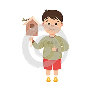 Obedient Boy with Good Breeding Holding Wooden Bird House Vector Illustration