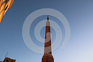 Obelisk and bell tower at famous landmark spanish steps rome italy