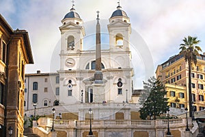 Obelisk and church Trinita dei Monti on the top of the Spanish steps in Rome