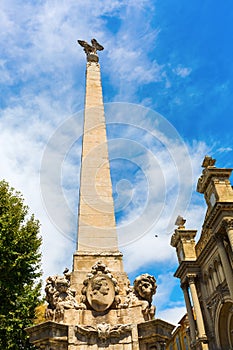 Obelisk in front of the Eglise de la Madeleine in Aix en Provence photo