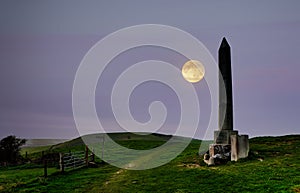 The Obelisk monument above Swanage, England photo