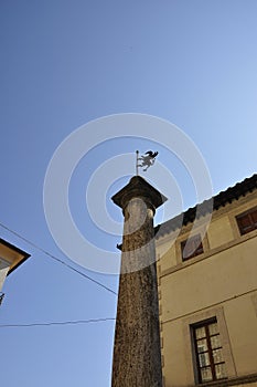 Obelisk in Piazzeta del Teatro Square from Montepulciano of VaL D`Orcia. Tuscany region. Italy