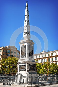 Obelisk on plaza de la Merced (Merced Square) in Malaga, Spain photo