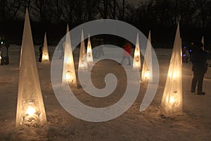 Obelisks of Ice with Candles Inside Light up the Night