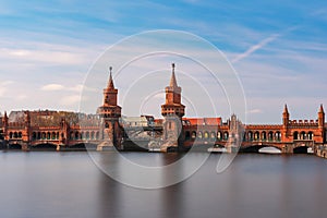 The Oberbaum Bridge connects the Berlin districts of Kreuzberg and Friedrichshain across the Spree