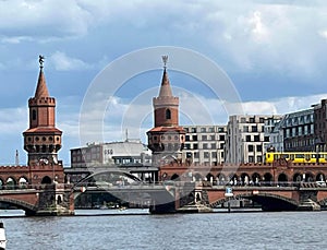 Oberbaum Bridge (German: OberbaumbrÃ¼cke) is a double-deck bridge crossing Berlin, Germany's River Spree, photo