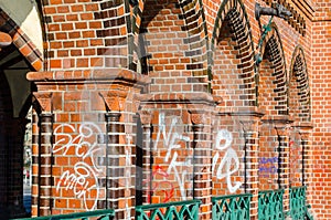 oberbaumbrucke in berlin is covered by graphitti....IMAGE photo
