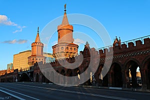 OberbaumbrÃ¼cke, a bridge over Spree river in Berlin, Germany, connects the districts of Friedrichshain and Kreuzberg