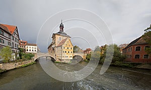 Obere bridge (brÃ¼cke) and Altes Rathaus and cloudy sky in Bamberg