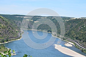 Oberwesel, Germany - 07 22 2020: Mittelrheintal with a river banks and ship traffic between Oberwesel and St. Goar