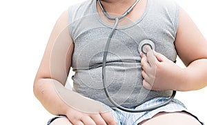 Obese asian boy check heart by stethoscope, isolated