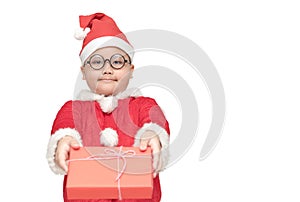 Obese fat boy in santa claus suit giving gift box and smile