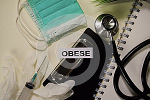 Obese with inspiration and healthcare/medical concept on desk background