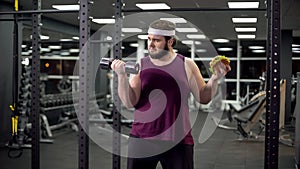Obese male choosing between sport and fast food, burger addiction and motivation