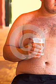 Obese man with beer