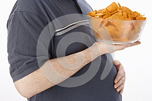 Obese Man Holding Bowl Of Nachos
