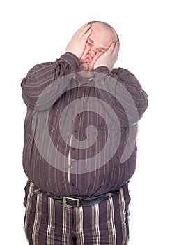 Obese man squashing his face