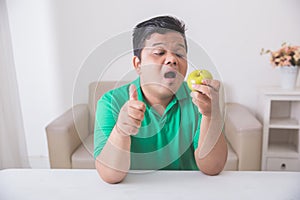 Obese man trying to eat healthy fresh food