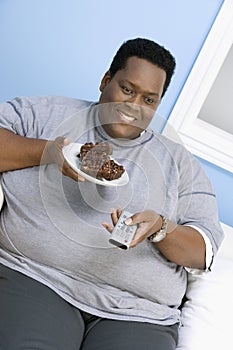 Obese Man Watching Television