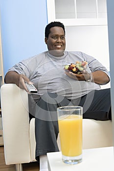 Obese Man Watching Television