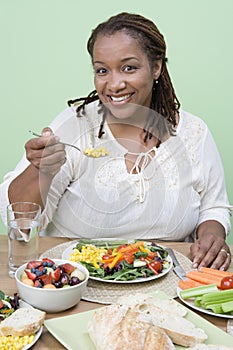 An Obese Woman Eating Food