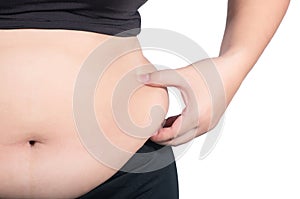 Obese woman, Fat overweight woman pinching her fat tummy on whit photo