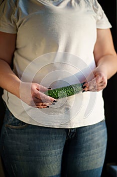 Obese woman with raw vegetables, healthy eating