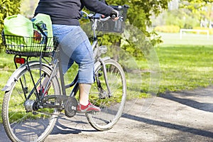 Obese woman riding a bike